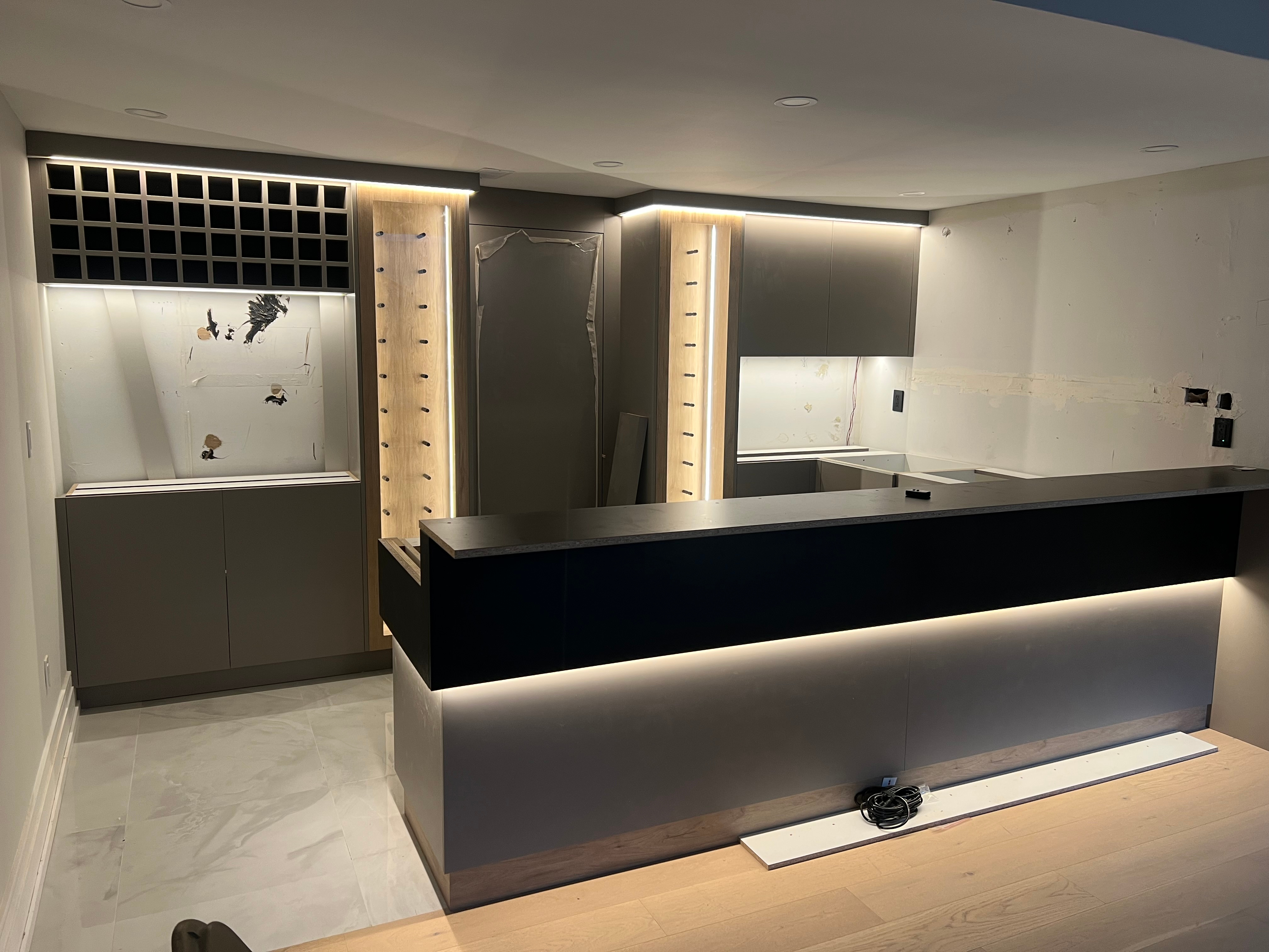 Finished interior with modern staircase and lighting